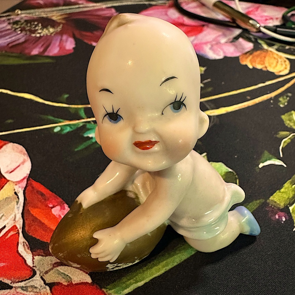 Porcelain Kewpie Style Figurine